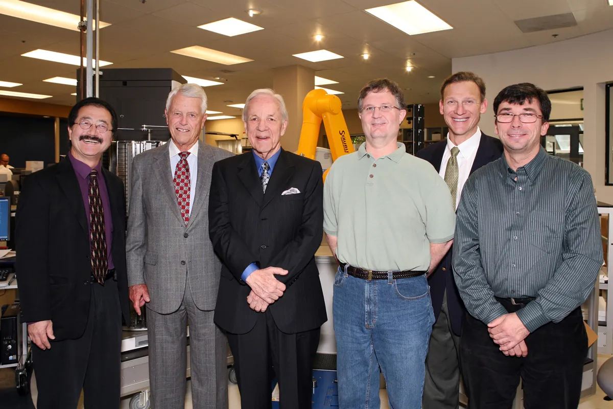 Conrad Prebys and group in Prebys Center