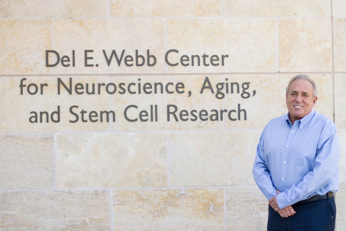 Randal Kaufman in front of the Del E. Webb Foundation building